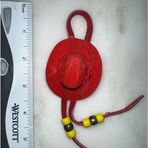 Vintage red cowboy had brooch